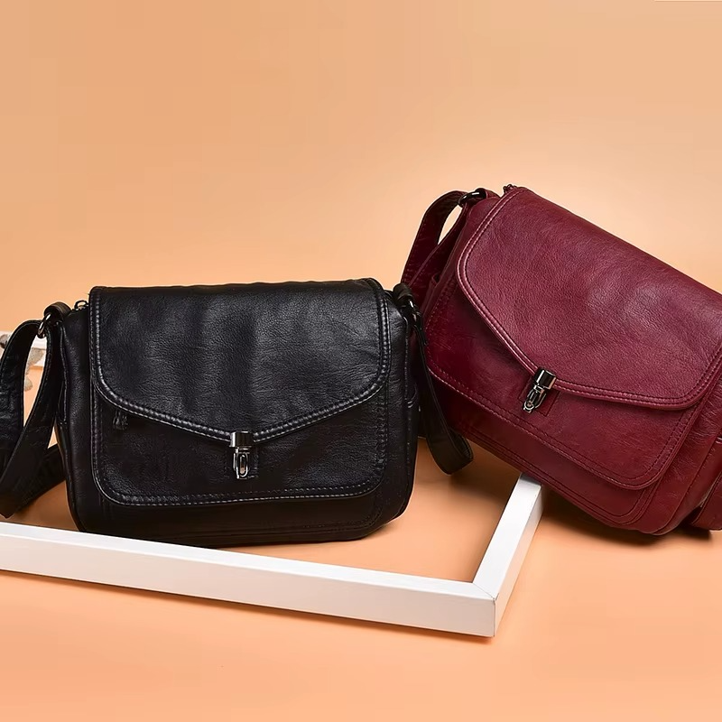 Cambria® | Flap Buckle Shoulder Bag